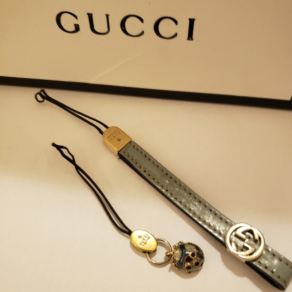 Gucci phone charms each piece sold $250.00